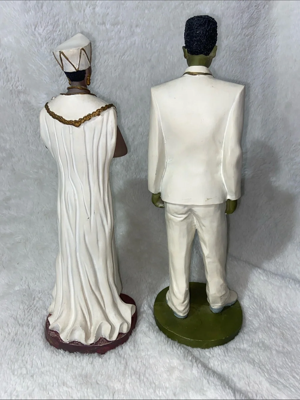 African American bride and groom wedding statues